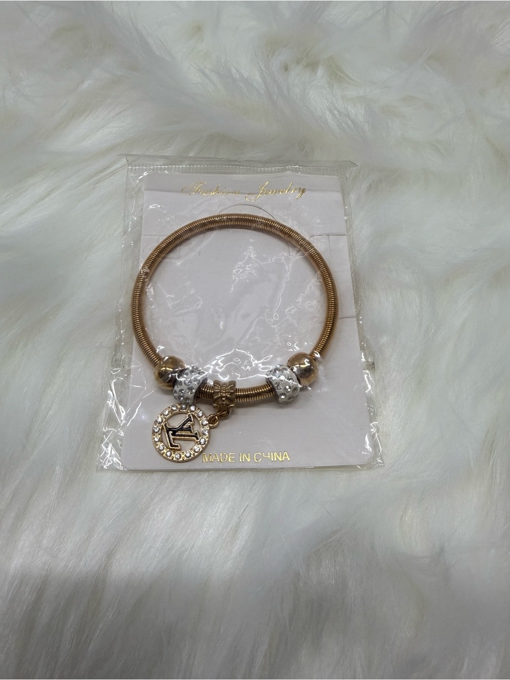 Gold-Tone Charm Bracelet with Crystal Accents fashion jewelry
